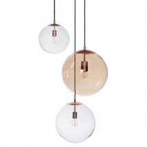 Group of three glass ball hanging lamps with copper