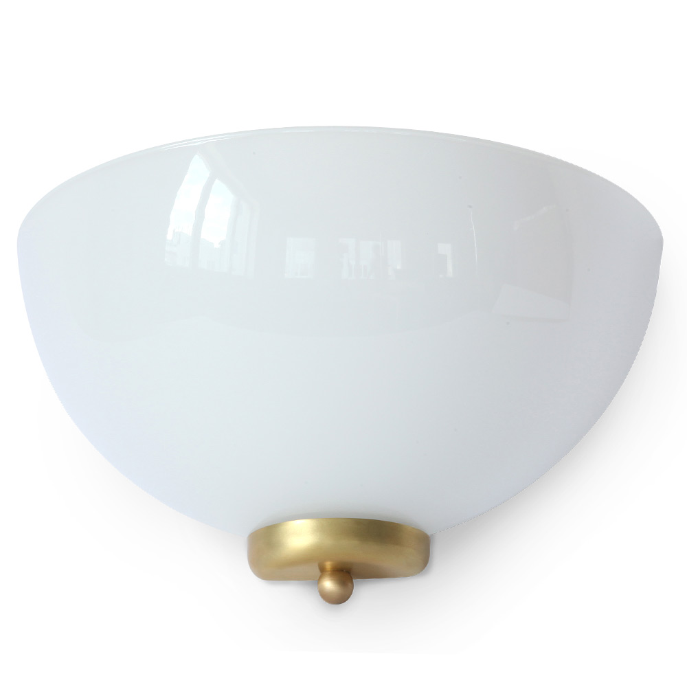 Art Nouveau wall light made of brass with hemispherical shade