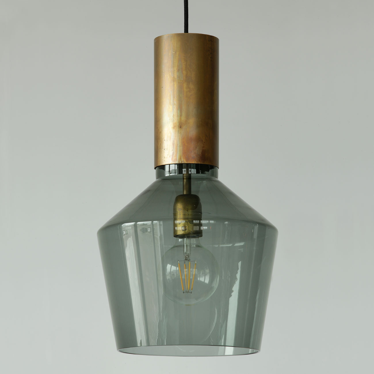 Designer pendant lamp with smoked glass and raw brass PHENO