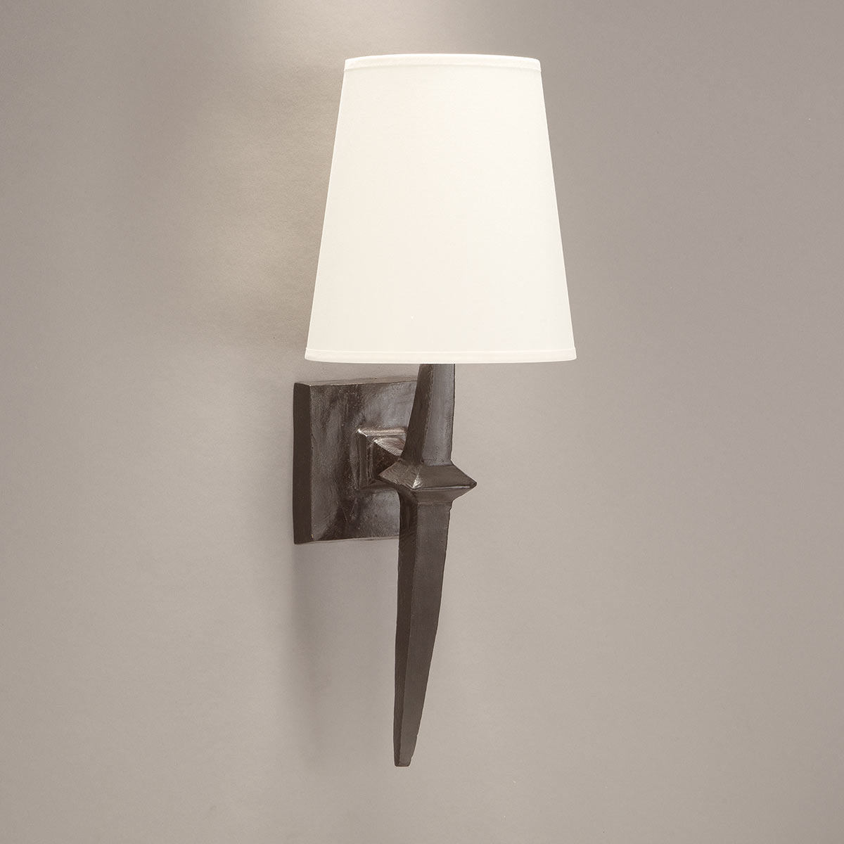 Sculptural bronze cast wall light ADAM with fabric shade