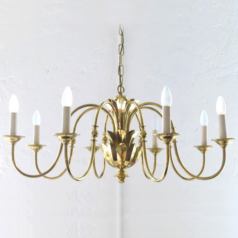 Magnificent eight-flame brass chandelier