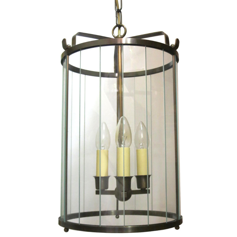 Hängeleuchte aus Messing mit facettierten Glasstreifen Hängeleuchte aus Messing mit facettierten Glasstreifen