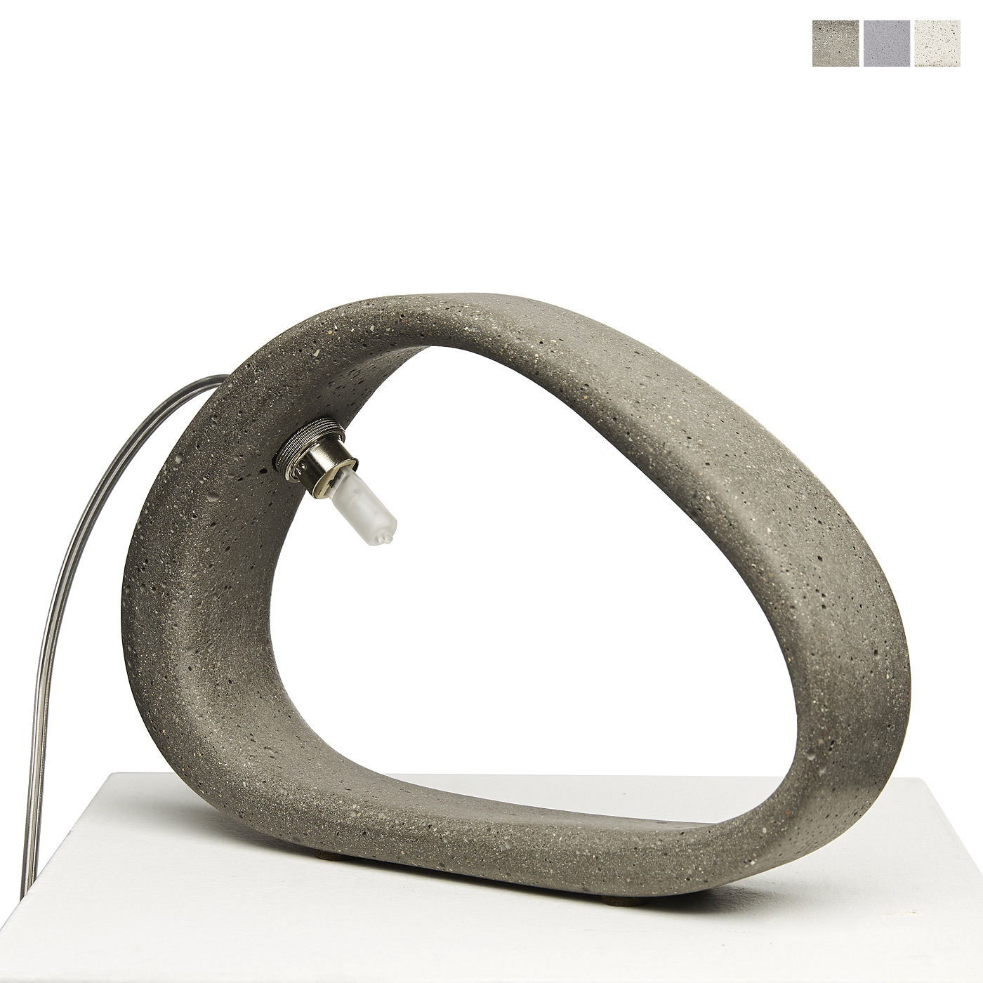 Organically shaped stone table light made of concrete Organically shaped stone table light made of concrete