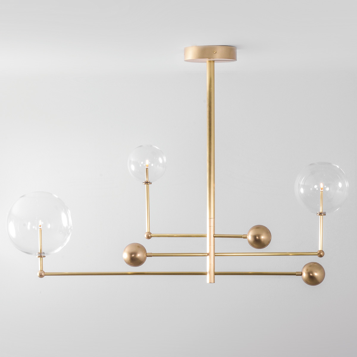 Rotatable clear glass ball chandelier made of brass Rotatable clear glass ball chandelier made of brass