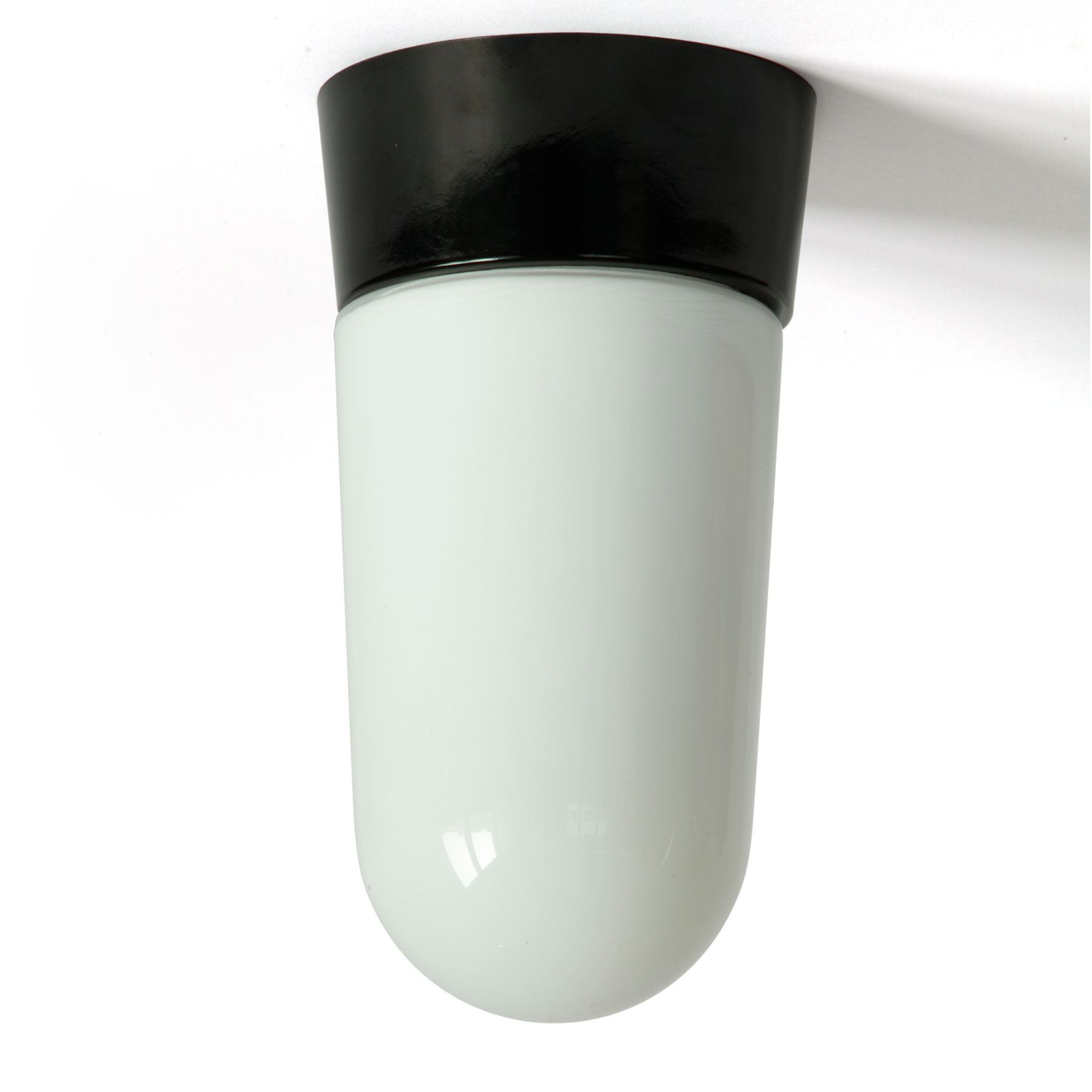 Einfache traditionelle Bakelit-Deckenleuchte mit opalem Zylinder-Schraubglas Einfache traditionelle Bakelit-Deckenleuchte mit opalem Zylinder-Schraubglas