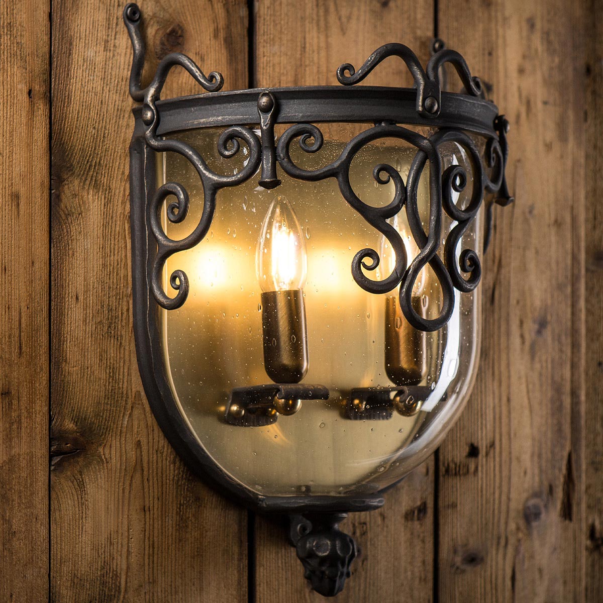 Impressive wall lamp made of glass and wrought iron